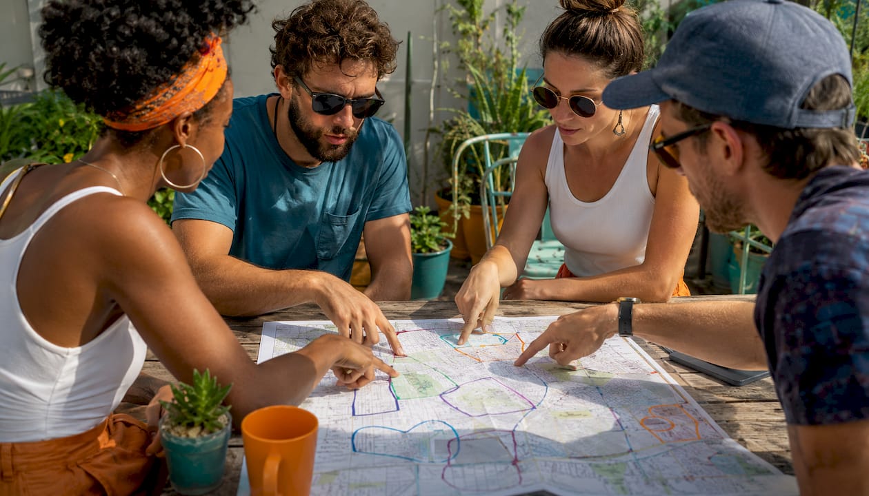Team planning geofence shapes on map, overhead view