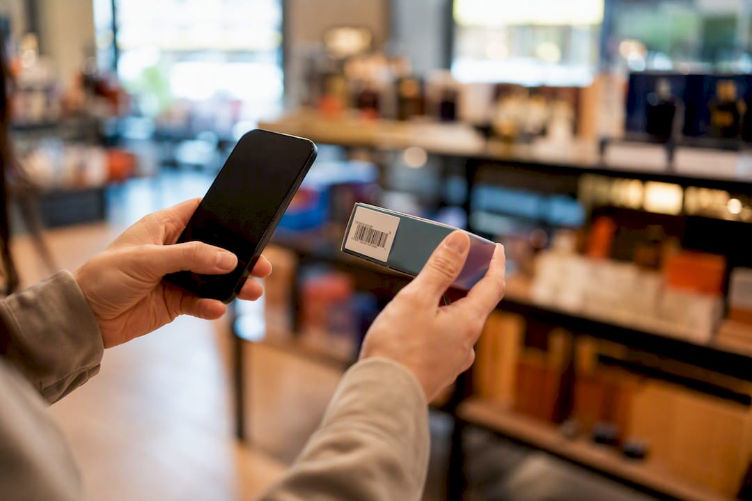 Customer using smartphone for retail loyalty campaign