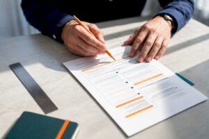 Hands refining a one-page marketing plan